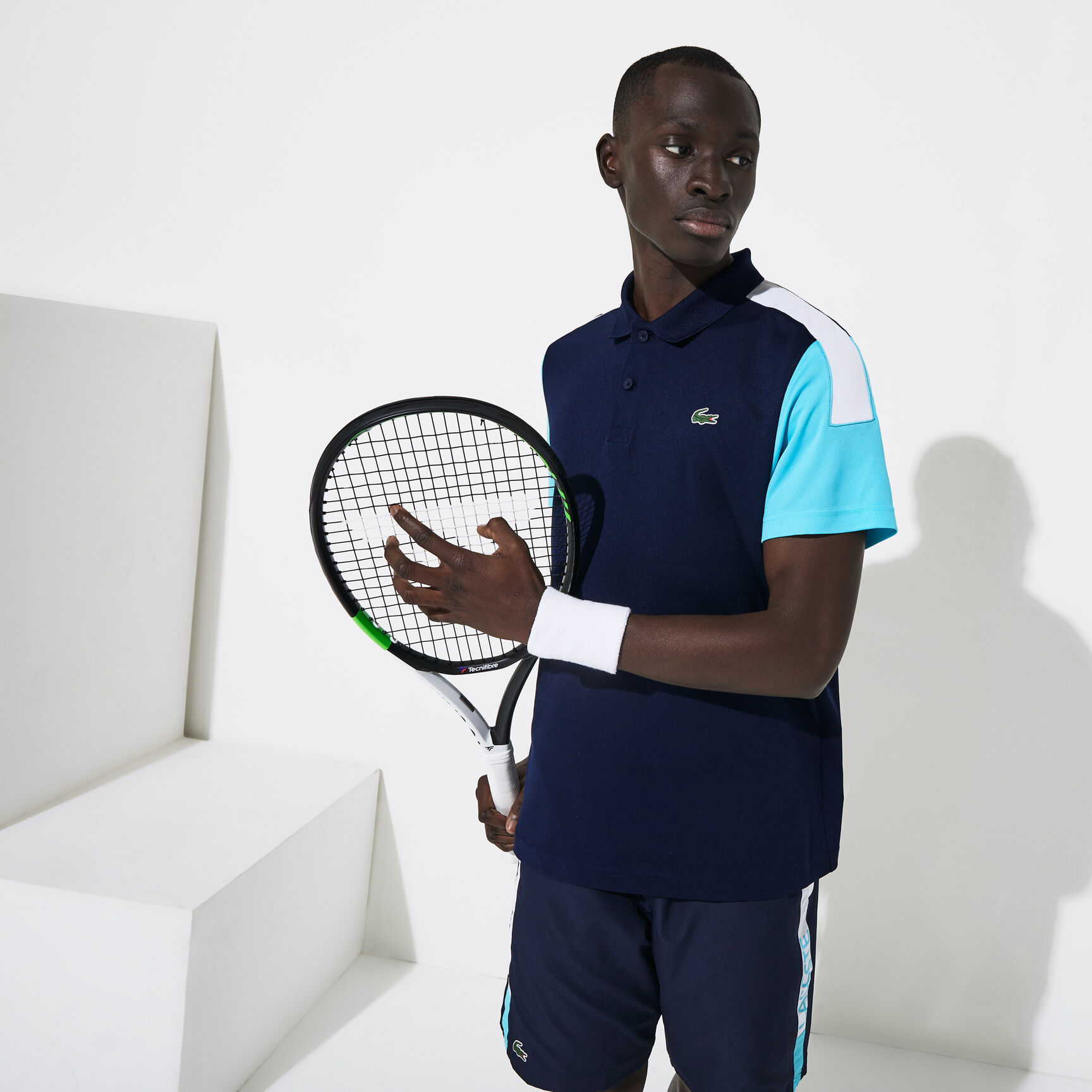 قميص بولو من مجموعةLacoste SPORT محيك من البيكيه ويسمح بمرور الهواء للرجال قميص بولو من مجموعةLacoste SPORT محيك من البيكيه ويسمح بمرور الهواء للرجال