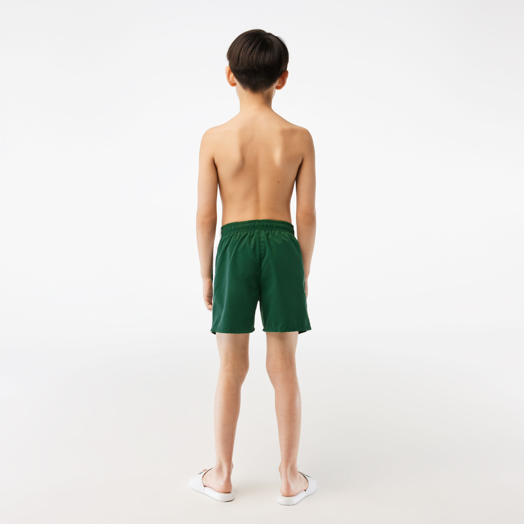 boy s lacoste x netflix contrast badge swim trunks