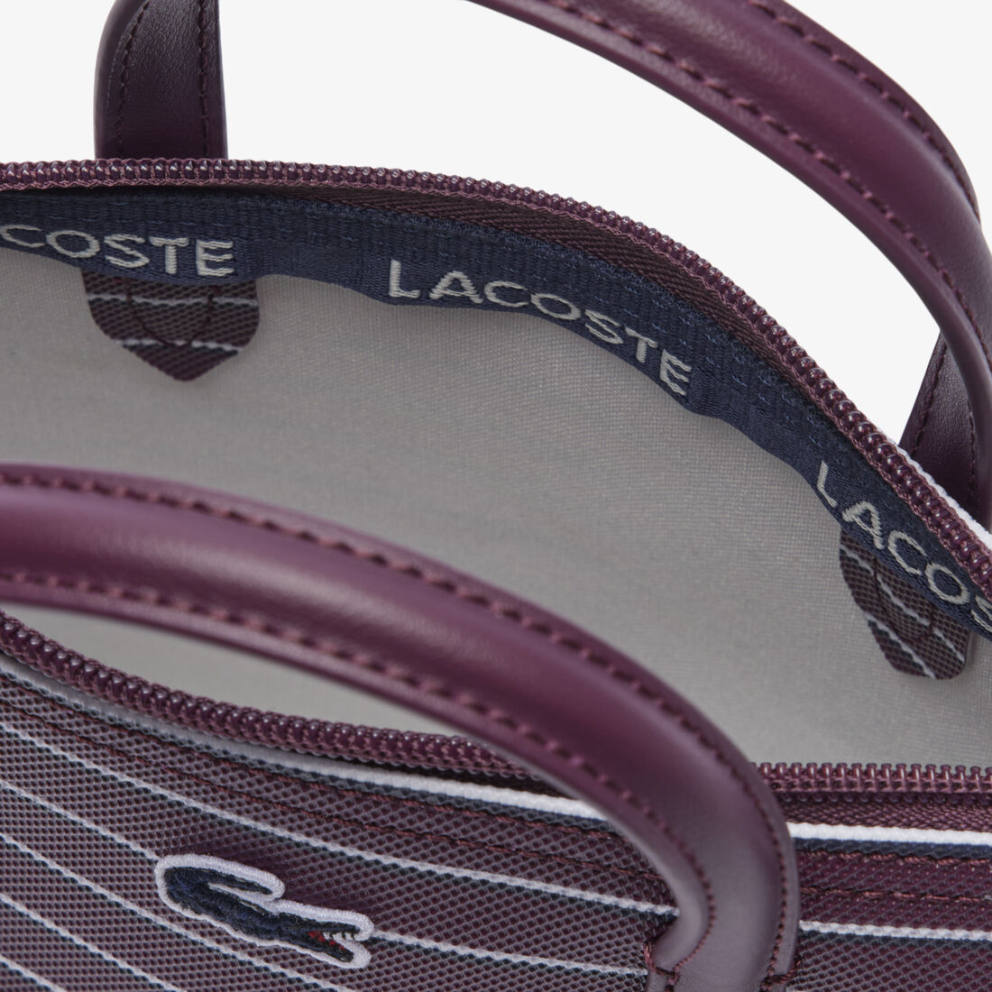 حقيبة يد صغيرة مخططة من مجموعة L.12.12 كونسبت حقيبة يد صغيرة مخططة من مجموعة L.12.12 كونسبت